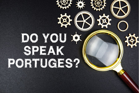 Do You Speak Portuges? text message with magnifying glass on black background