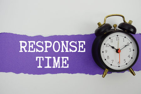 Response Time text on purple with white paper torn ripped of horizontal and alarm clock