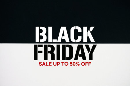 Black Friday Sale up to 50% off text on black and white background