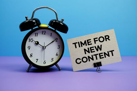 Time for new Content text with alarm clock on blue and purple background