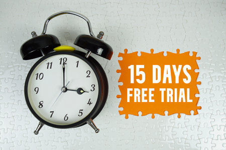 20 Days Free Trial text with alarm clock on orange backgroundの写真素材