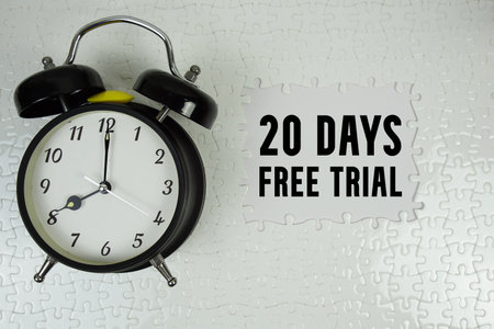 20 Days Free Trial text with alarm clock on white backgroundの写真素材