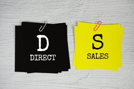DS - Direct Sales text on stick note on concrete backgroundの写真素材