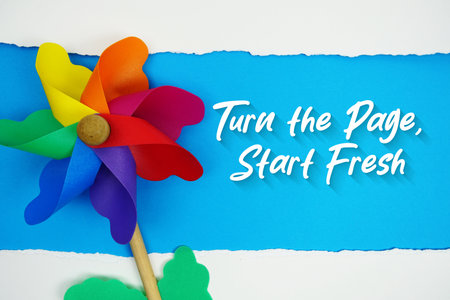 Turn the Page, Start Fresh motivational and inspirational quotes message on blue backgroundの写真素材