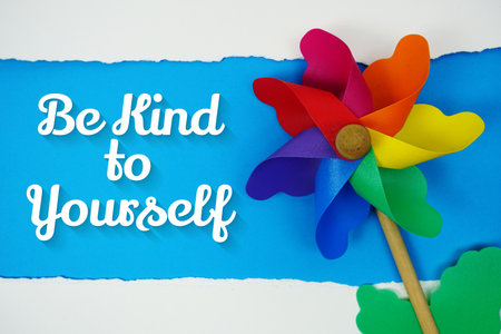 Be Kind to Yourself motivational and inspirational quotes message on blue backgroundの写真素材