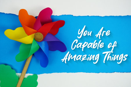 You Are Capable of Amazing Things motivational and inspirational quotes message on blue backgroundの写真素材