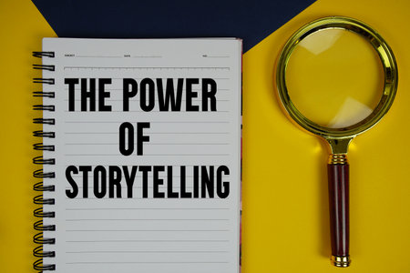 The Power Of Storytelling text with magnifying glass on yellow backgroundの写真素材
