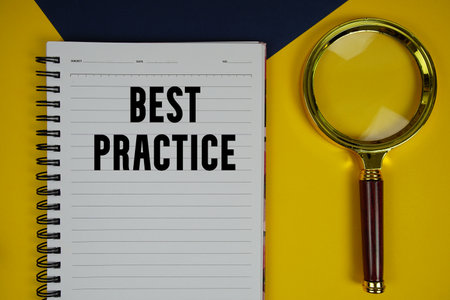 Best Practice text with magnifying glass on yellow backgroundの写真素材