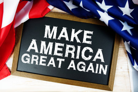 American flag with blackboard on wooden background