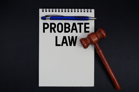 Probate Law text written on notepad with gavel on black backgroundの写真素材