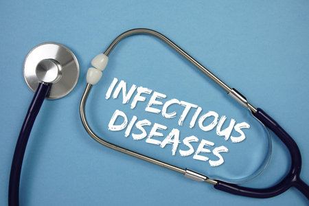Infectious Disorders text with Stethoscope on blue backgroundの写真素材