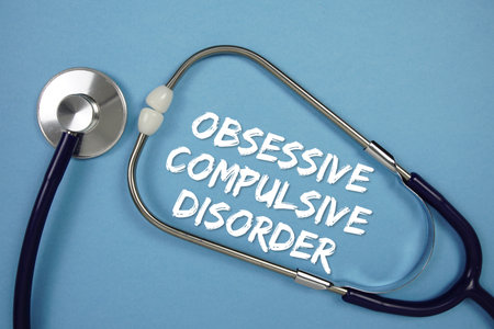 Obssessive Compulsive Disorders text with Stethoscope on blue backgroundの写真素材