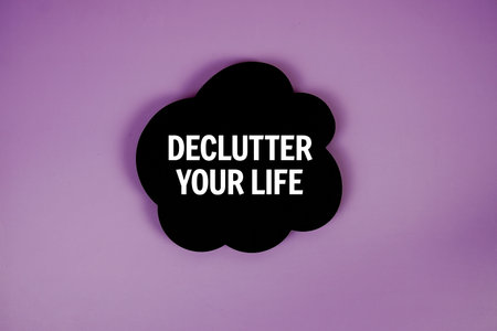 Declutter Your Life text with speech bubble top view on purple backgroundの写真素材