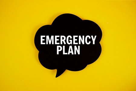 Emergency Plan text with speech bubble top view on yellow backgroundの写真素材