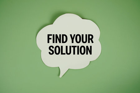 Find Your Solution text with speech bubble top view on green backgroundの写真素材