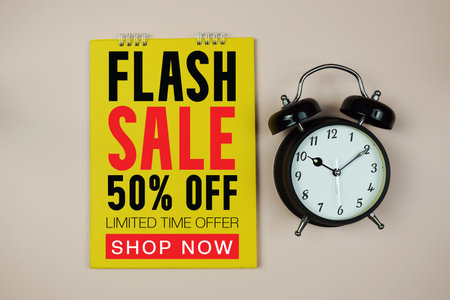 Flash Sale text with alarm clock on pink backgroundの写真素材