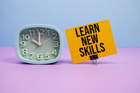 Learn New Skills text and alarm clock on blue and purple background