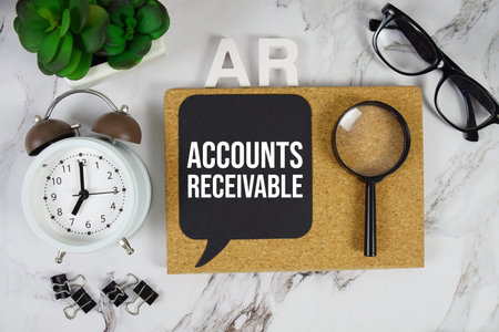 AR - Accounts Receivable acronym with alarm clock and magnifying glass, Business concept background