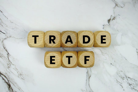 Trade ETF alphabet letters on marble background