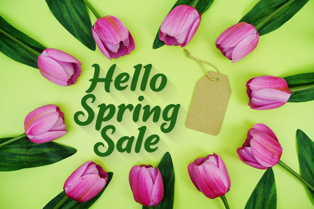 Hello Spring Sale and Price tag 25% off  with tulip flowers on green background