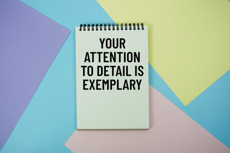 Your Attention To Detail Is Exemplary text written on notepad with pen on marble background