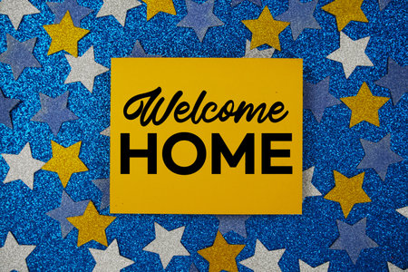 Welcome Home Card on Blue Glitter Star Background