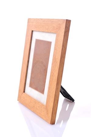 wooden desktop picture frame isolated on whiteの写真素材