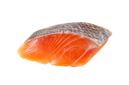 fresh uncooked red fish fillet over whiteの写真素材