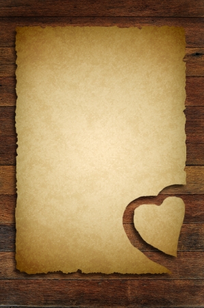 old paper with wooden heart sign の写真素材