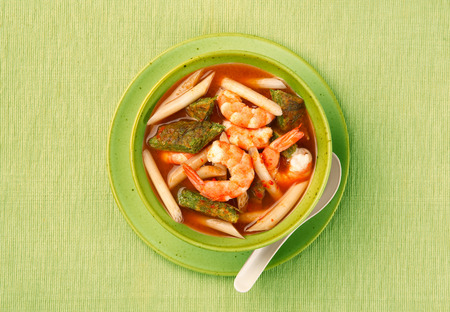 Sour soup made of tamarind paste with shrimp and several kinds of vegetables の写真素材