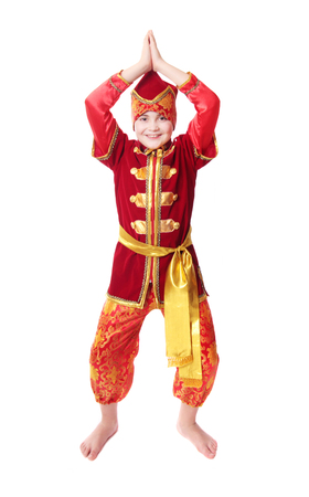 child in fancy dress isolated on white backgroundの写真素材