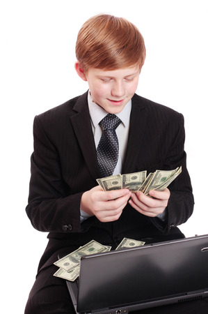 boy with notebook and moneyの写真素材