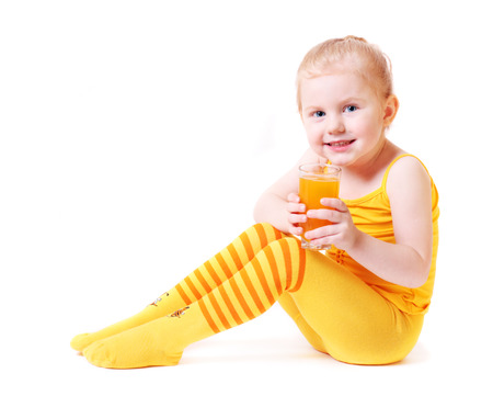 girl with juice isolated on whiteの写真素材