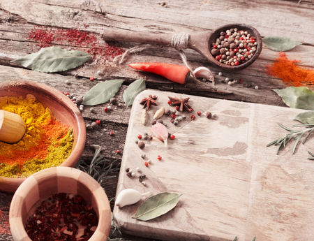 herbs and spices on a wooden backgroundの写真素材