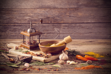 herbs and spices on a wooden backgroundの写真素材