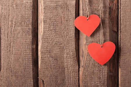 red hearts on wooden backgroundの写真素材