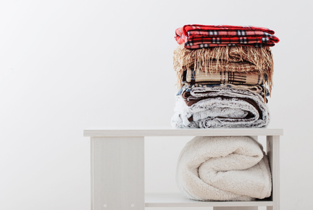 pile of blankets on a white backgroundの写真素材