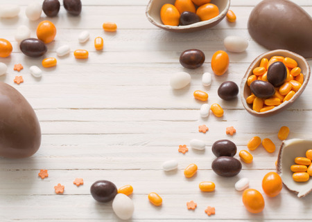 Chocolate Easter Eggs Over Wooden Backgroundの写真素材