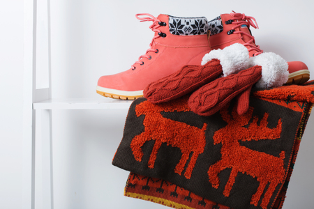 beautiful winter female clothes and shoes on white backgroundの写真素材
