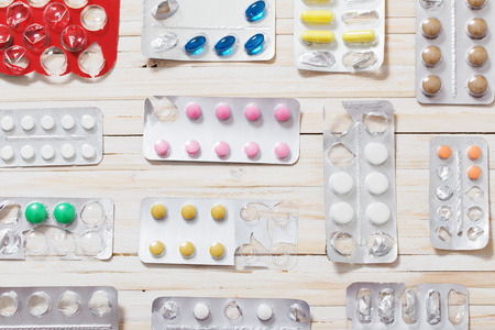 medical pills, antibiotics on a wooden backgroundの写真素材