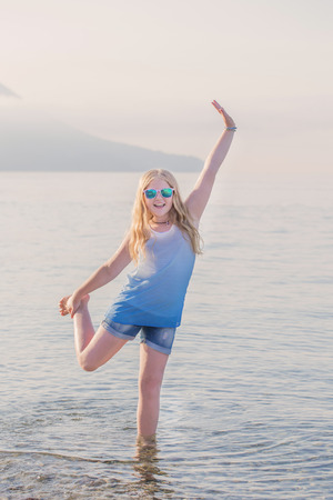 happy girl in seaの写真素材