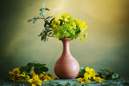 Still life with yellow spring flowersの写真素材