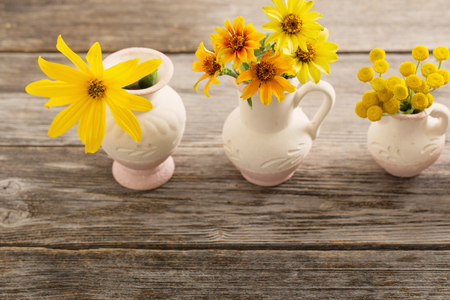 Still life with yellow flowersの写真素材