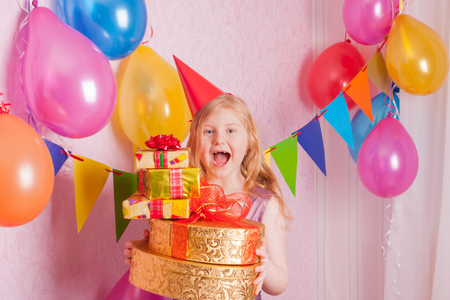 Birthday girl and giftsの写真素材