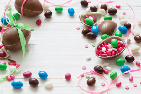 Chocolate Easter Eggs Over Wooden Background