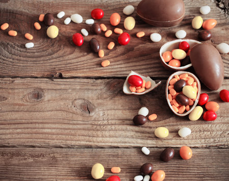 Chocolate Easter Eggs Over Wooden Background