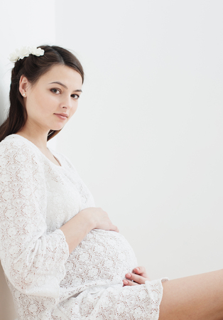 beautiful pregnant women indoorの写真素材