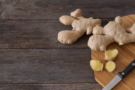 Ginger on wooden backgroundの写真素材
