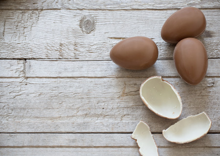 Chocolate Easter Eggs Over Wooden Backgroundの写真素材