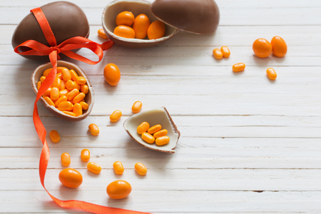 Chocolate Easter Eggs Over Wooden Backgroundの写真素材